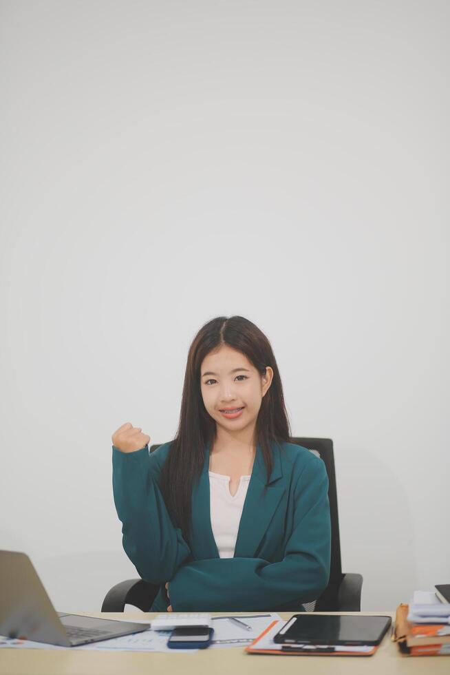 Business, finance and employment, female successful entrepreneurs concept. Friendly smiling office manager greeting new coworker. Businesswoman welcome clients with hand wave, hold laptop photo