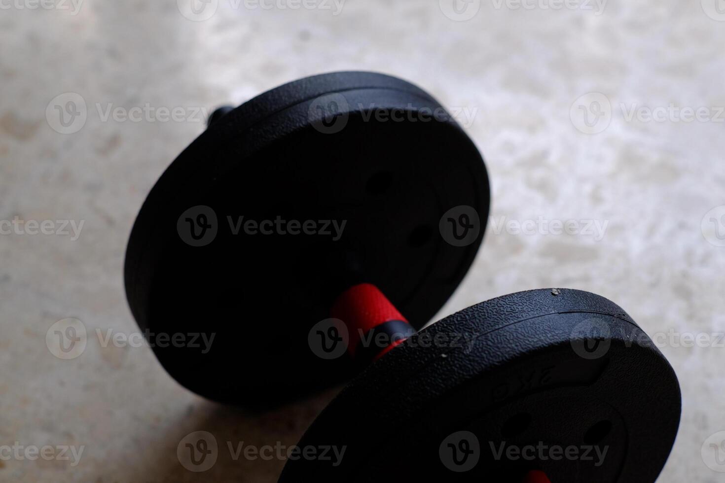 A versatile, adjustable weight barbell ideal for strength training and fitness routines at home or in gyms. photo