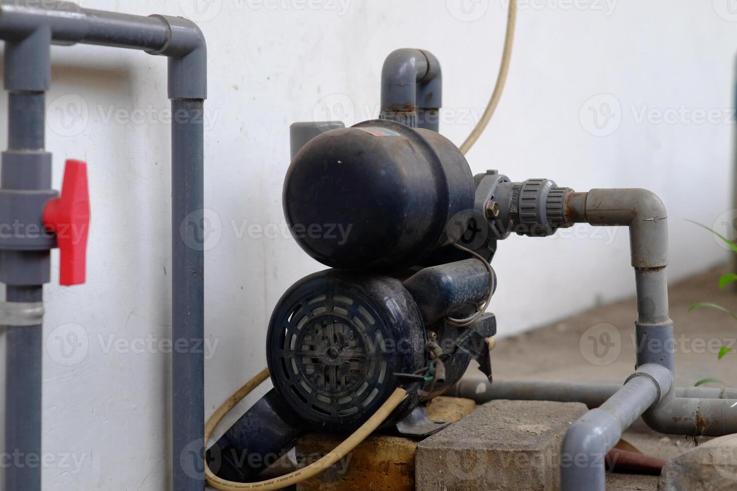 A close-up of a water pump showcasing its design for effective water circulation and fluid management in various applications. photo