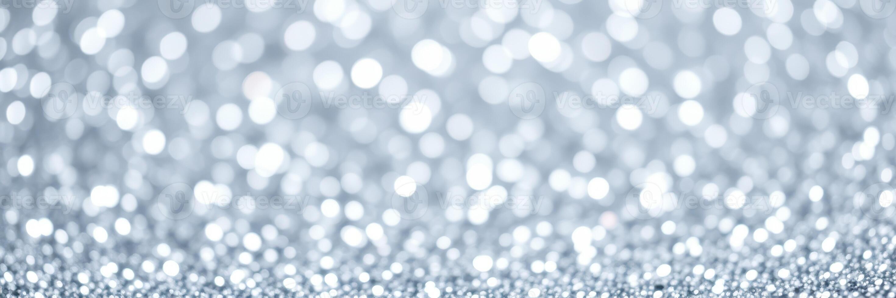 Sparkling silver background filled with shimmering light reflections creating an elegant atmosphere for events photo