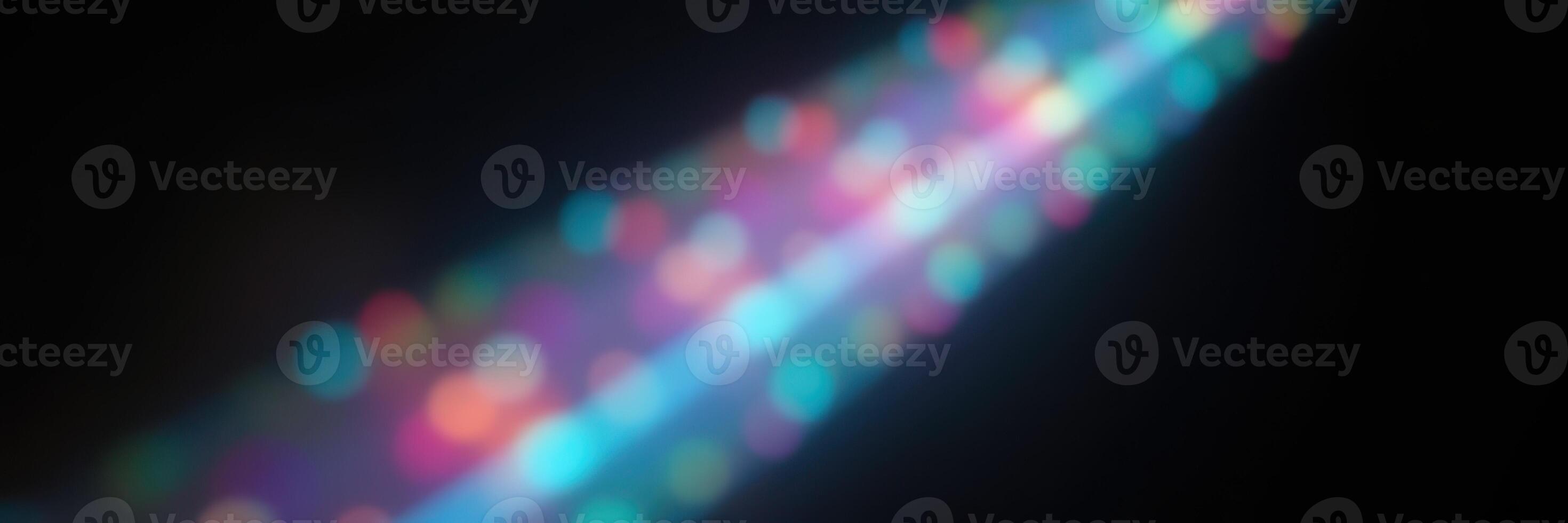 Colorful light streaks create a mesmerizing effect in a dark environment during a nighttime event photo