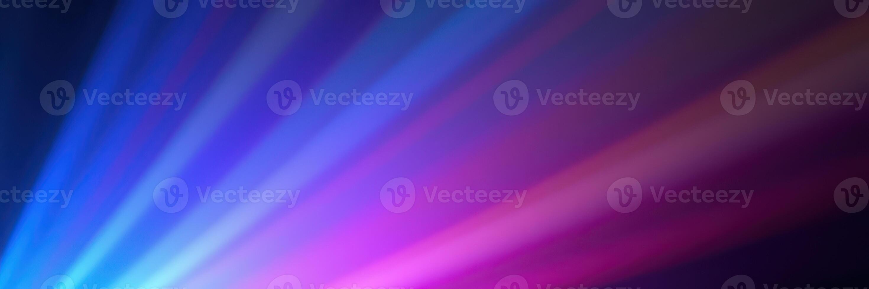 Vibrant light beams create an enchanting atmosphere in a dark setting during a night event photo