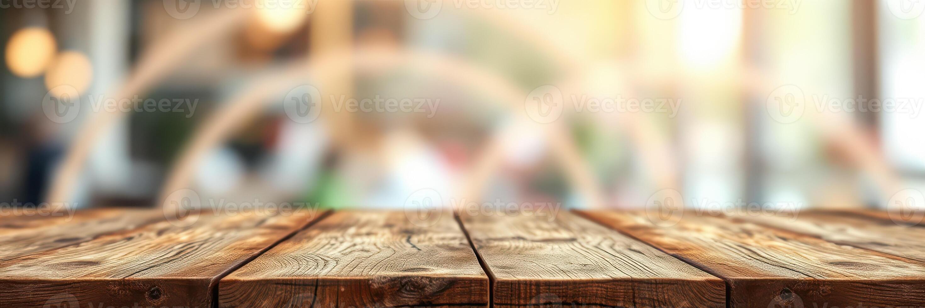 Rustic wooden table in a bright, cozy cafe setting during the afternoon with blurred background photo