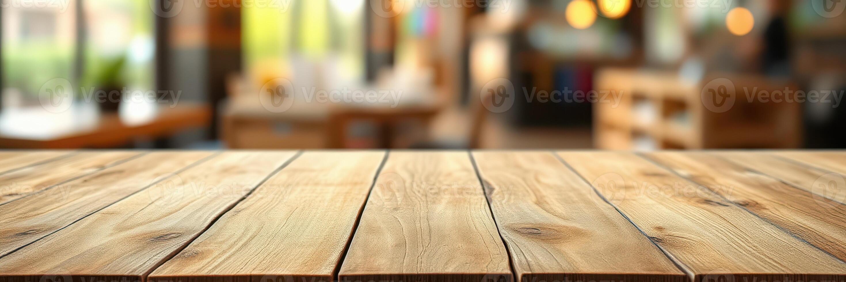 Beautifully crafted wooden table surface in a cozy cafe setting with blurred background of customers photo