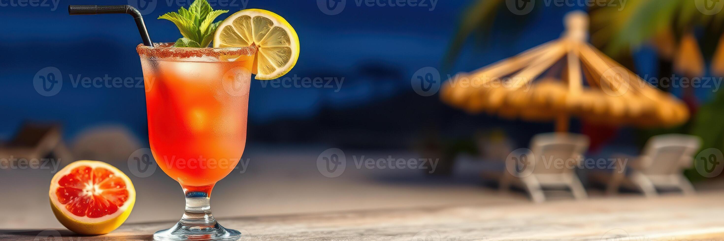 Refreshing tropical cocktail served at a beachside lounge during sunset with vibrant colors photo