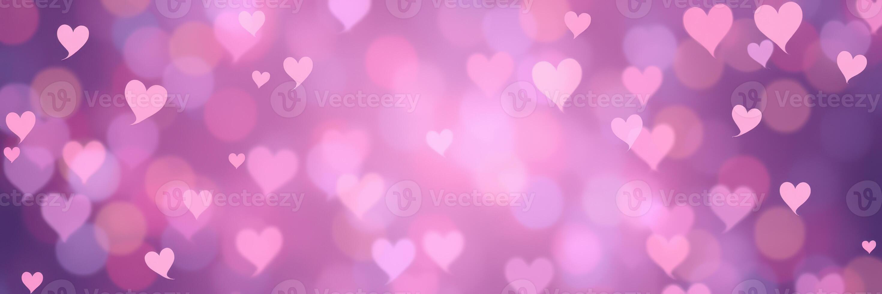 Colorful hearts create a whimsical background in soft pink and purple tones for romantic occasions photo