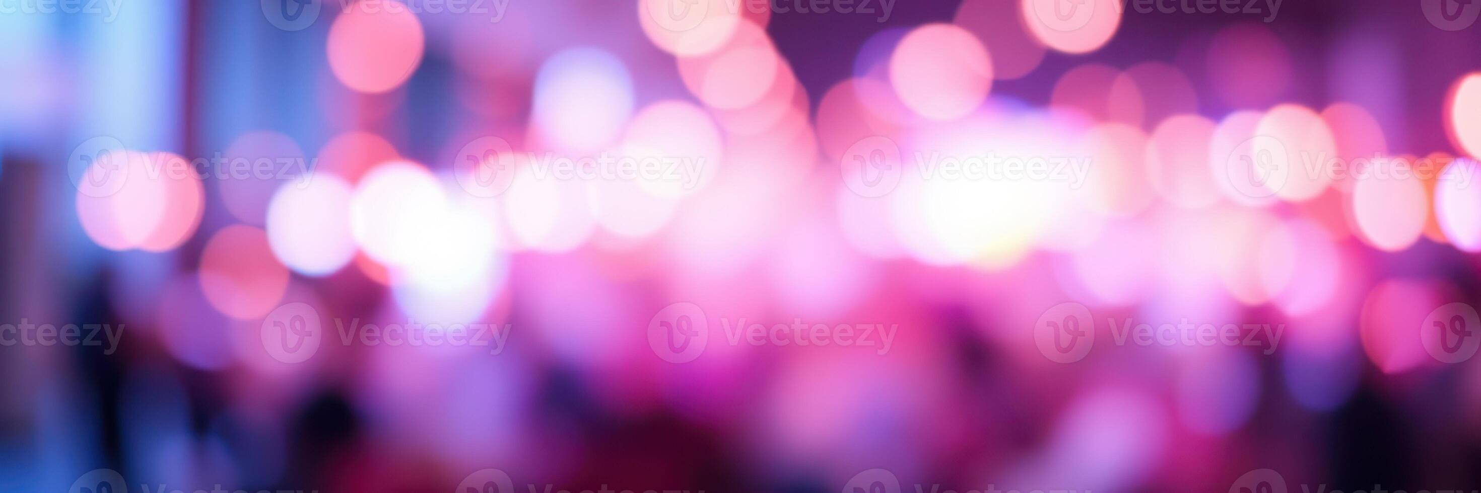 Vibrant city nightlife filled with colorful lights, creating a lively atmosphere in the evening hours photo