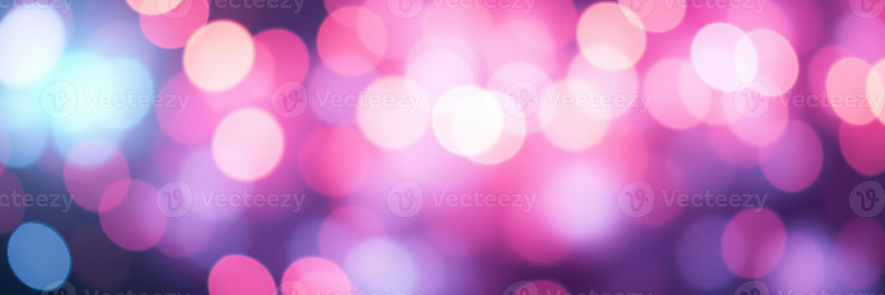 Colorful bokeh lights create a festive atmosphere at a nighttime event in the city photo