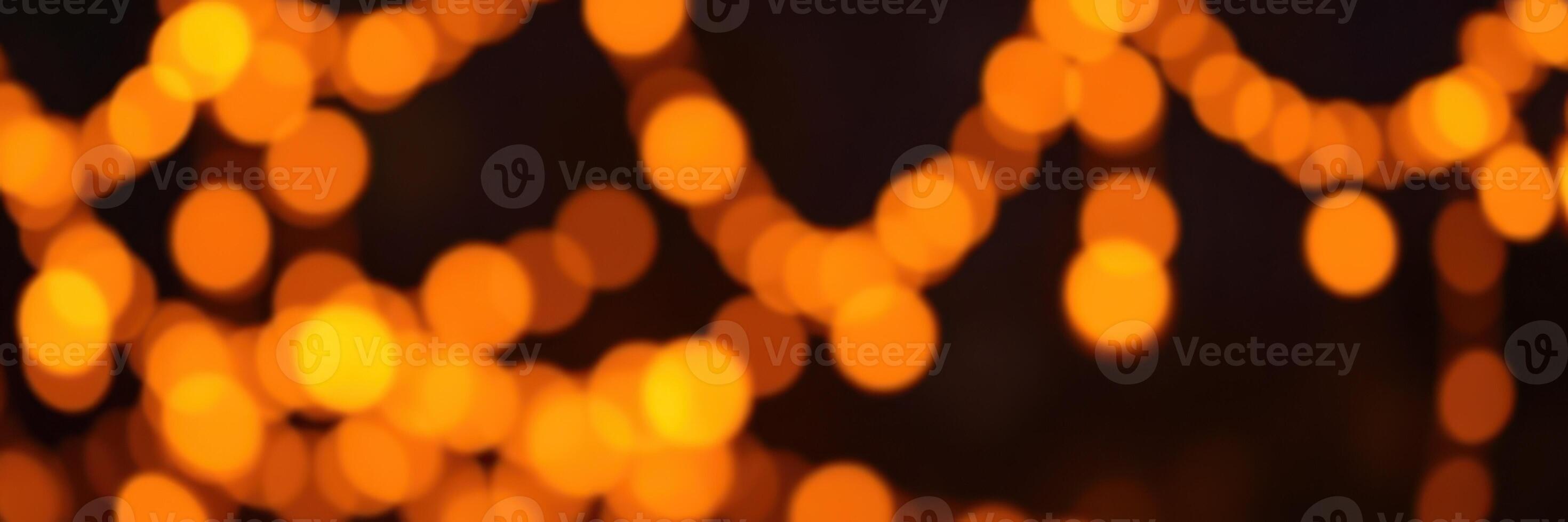 Warm glowing lights create a cozy atmosphere during a festive evening gathering in a backyard setting photo