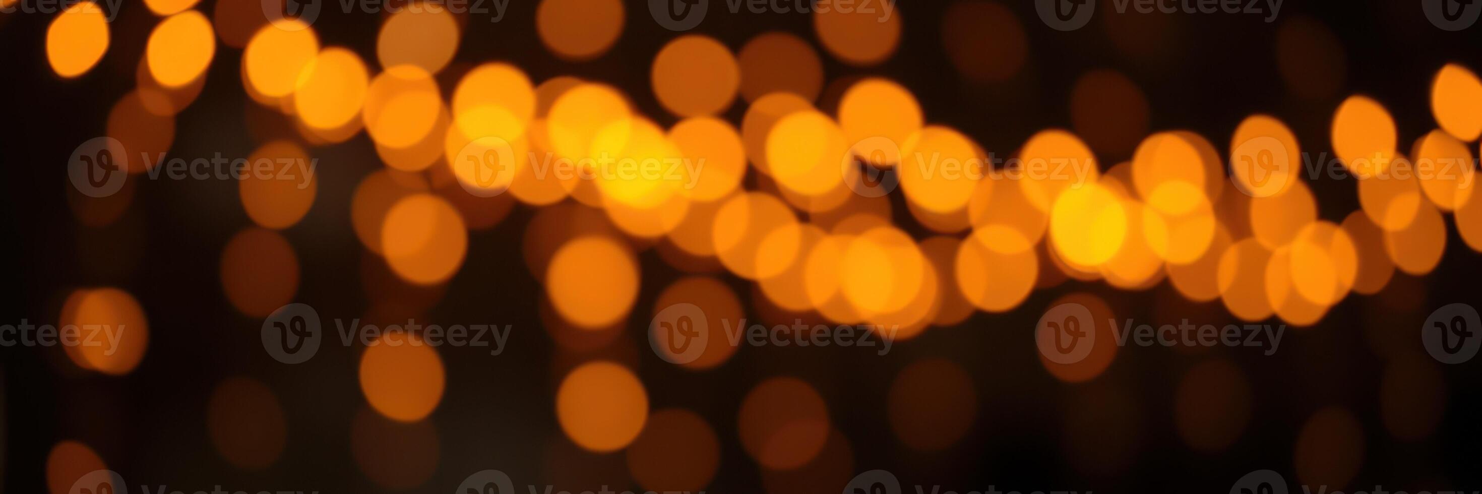 Warm golden lights create a cozy atmosphere for a festive gathering during the holiday season photo