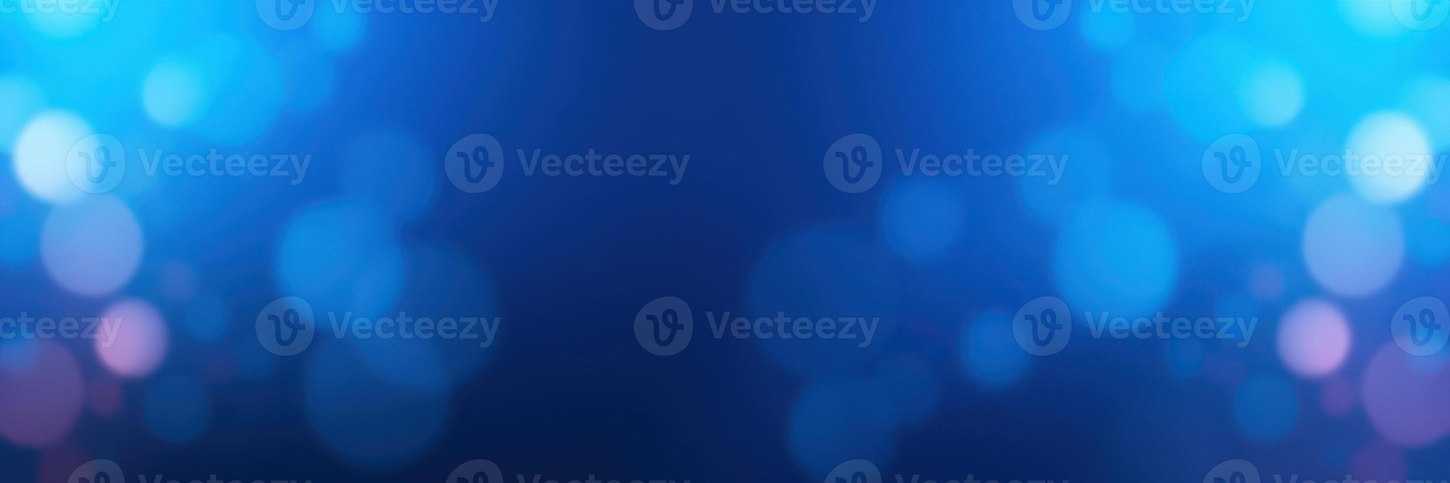 Vibrant blue bokeh background creates a tranquil atmosphere perfect for design projects, digital art, and presentations photo