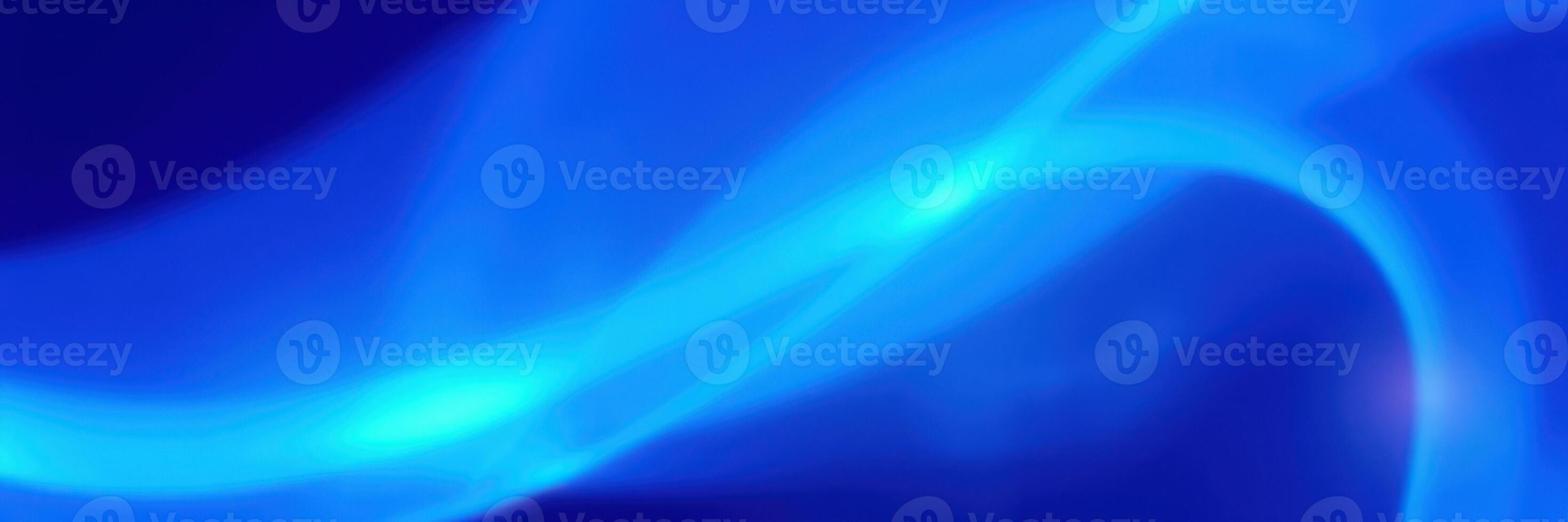 Luminous blue wave patterns create a mesmerizing abstract display in a tranquil setting photo