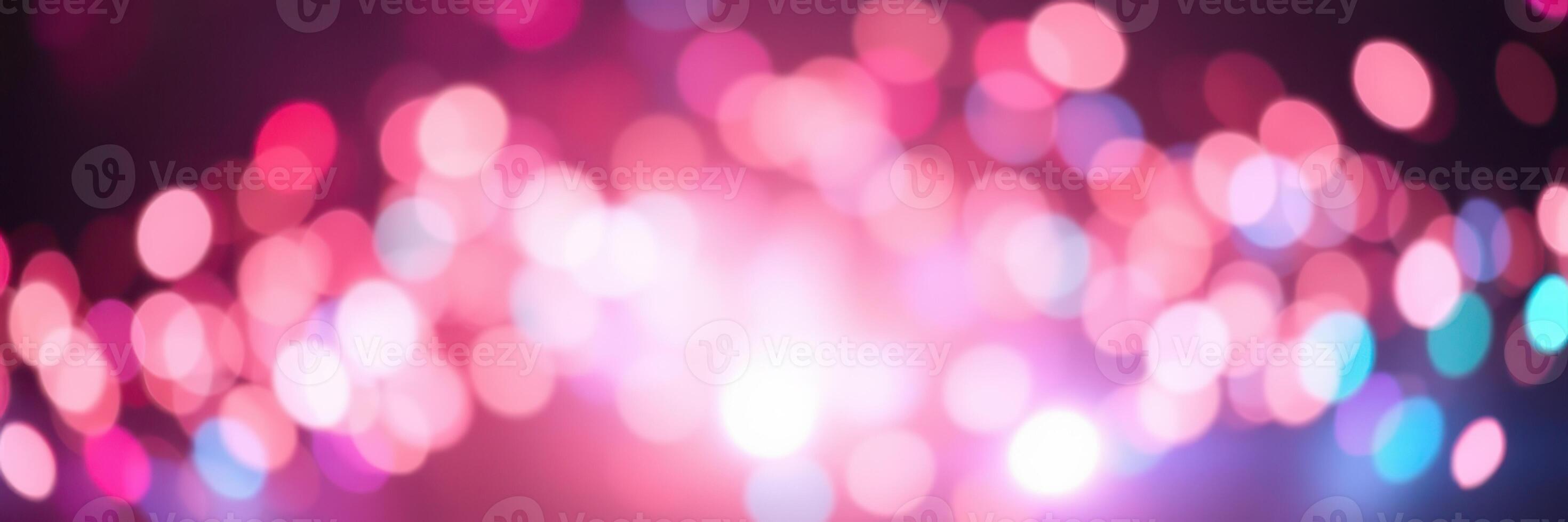Vibrant bokeh lights create a festive atmosphere at a night event in an urban setting during early evening hours photo