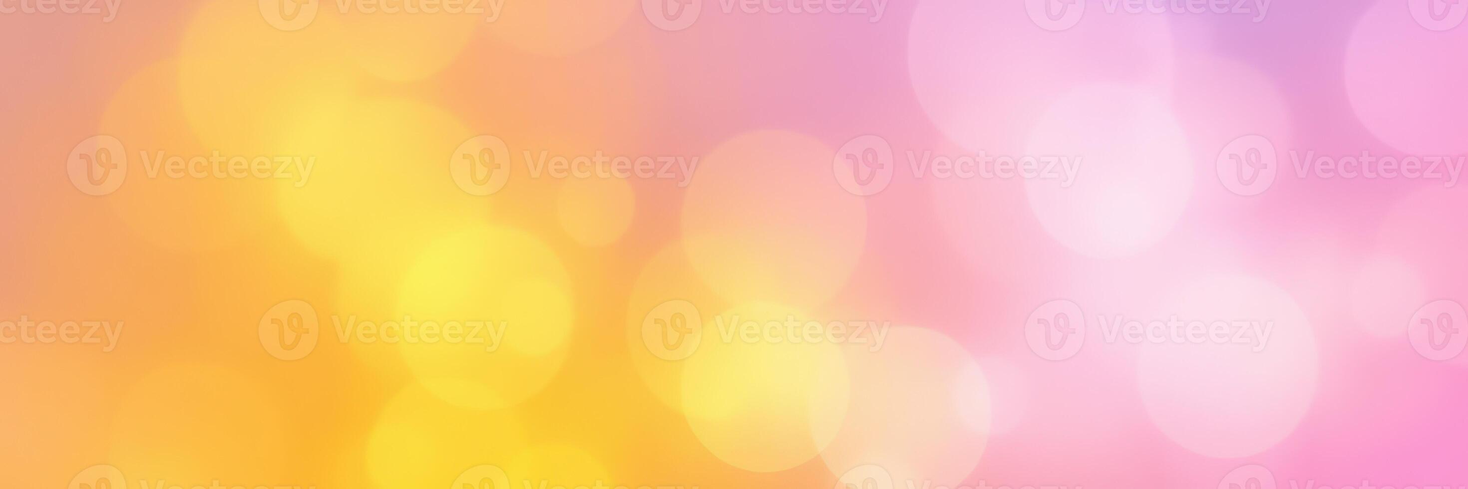 Bright and colorful bokeh background with warm yellow and pink hues for creative projects and designs photo