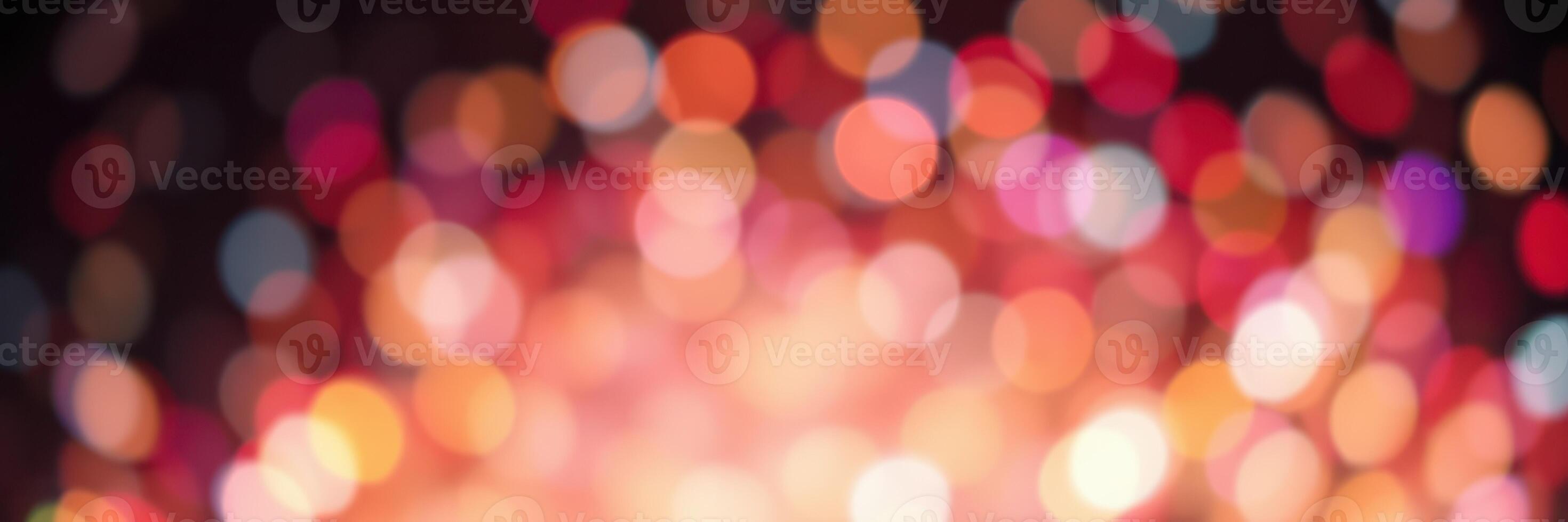 Colorful bokeh effect with vibrant lights creating a festive atmosphere during a celebration at night photo