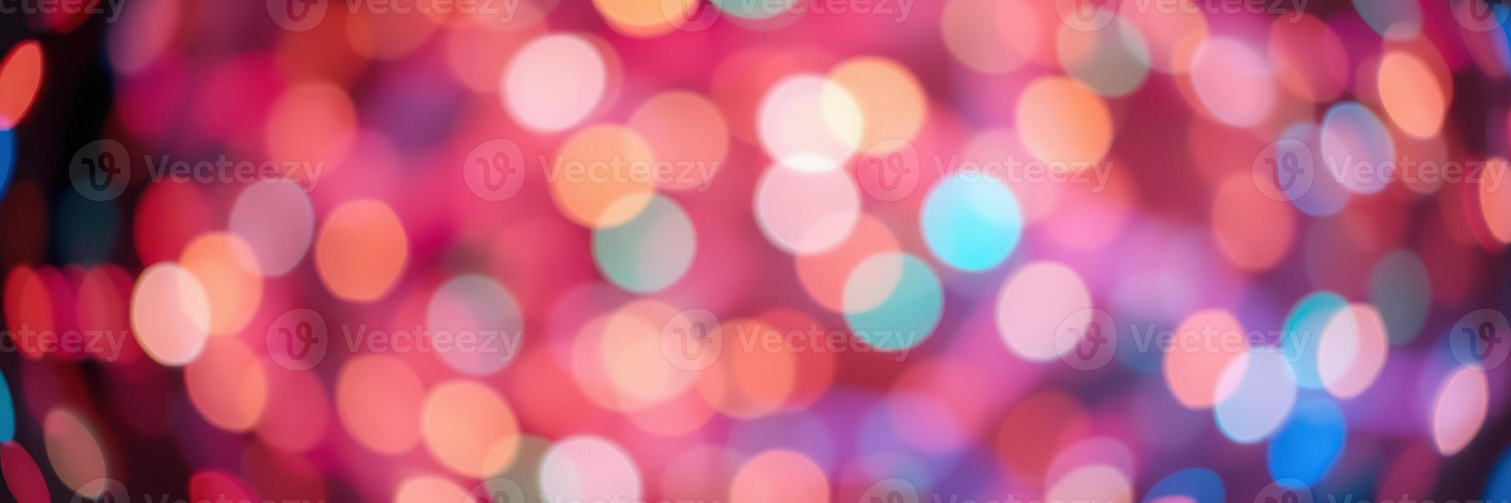 Colorful bokeh lights create a vibrant atmosphere during a festive celebration at night photo