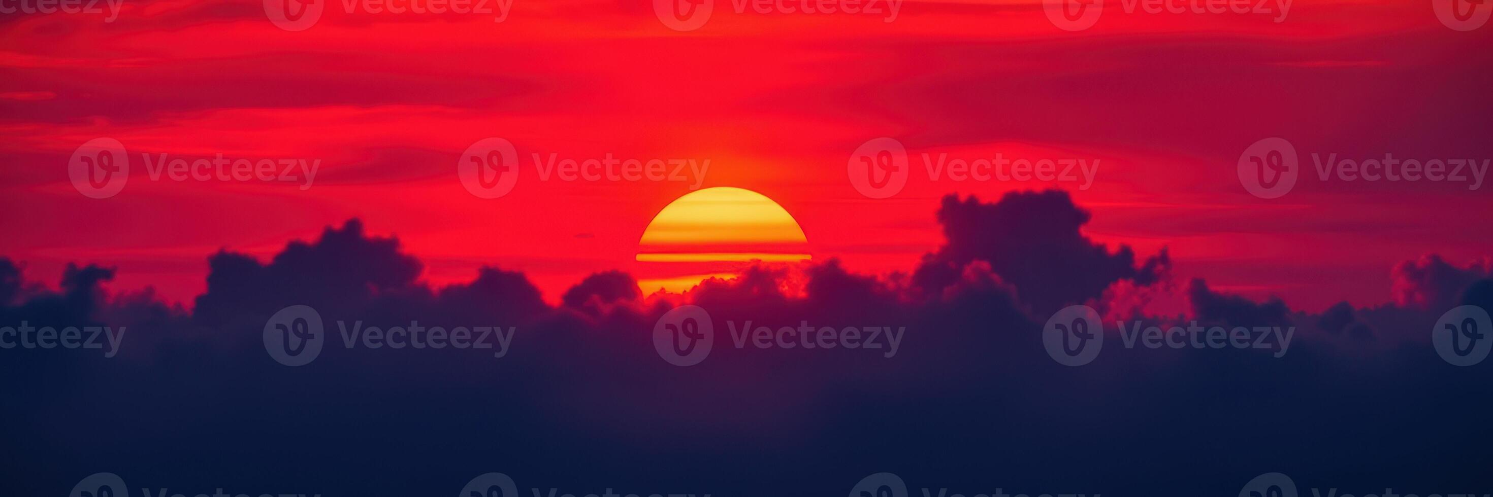 Vibrant sunset over the horizon with clouds and a colorful sky at twilight photo