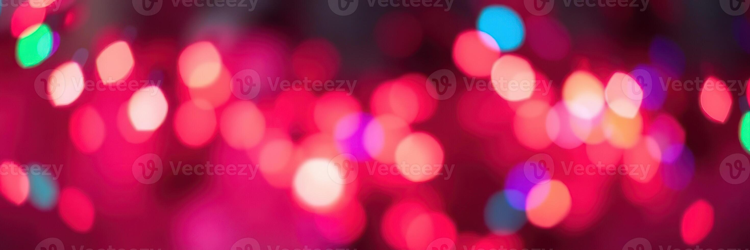 Colorful lights create a festive atmosphere during a nighttime celebration with blurred backgrounds and vibrant hues photo