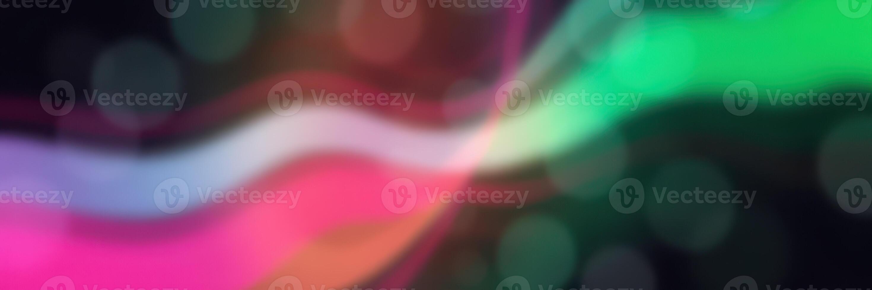 Colorful abstract waves with vibrant hues flowing in a dark background at a digital art exhibition photo
