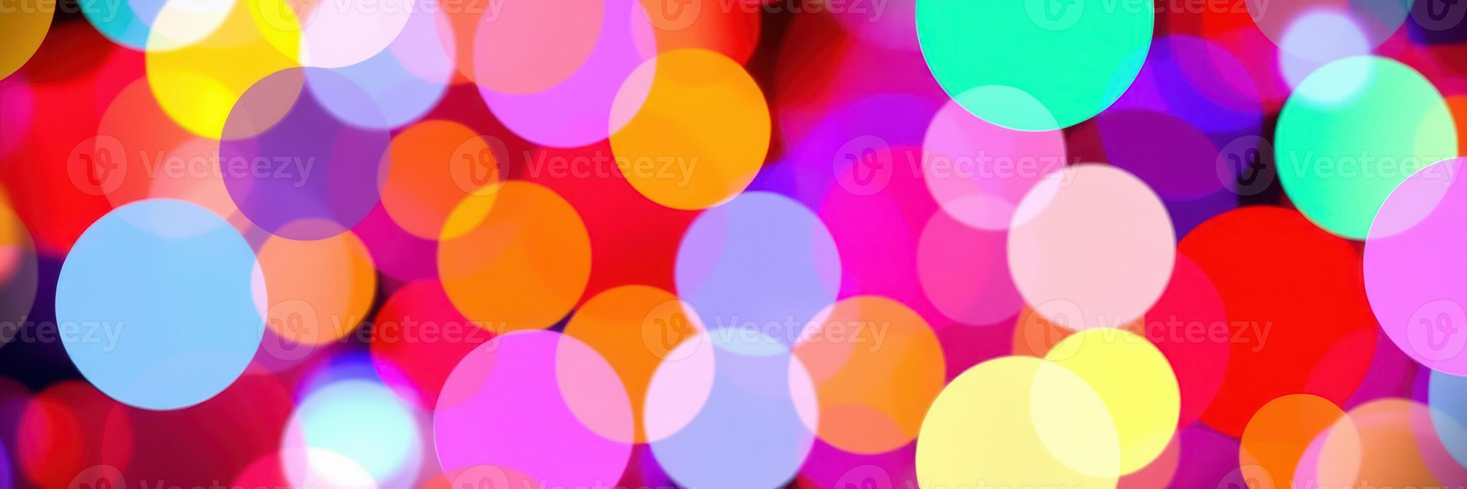 Colorful bokeh lights create a vibrant atmosphere in a festive celebration at night photo