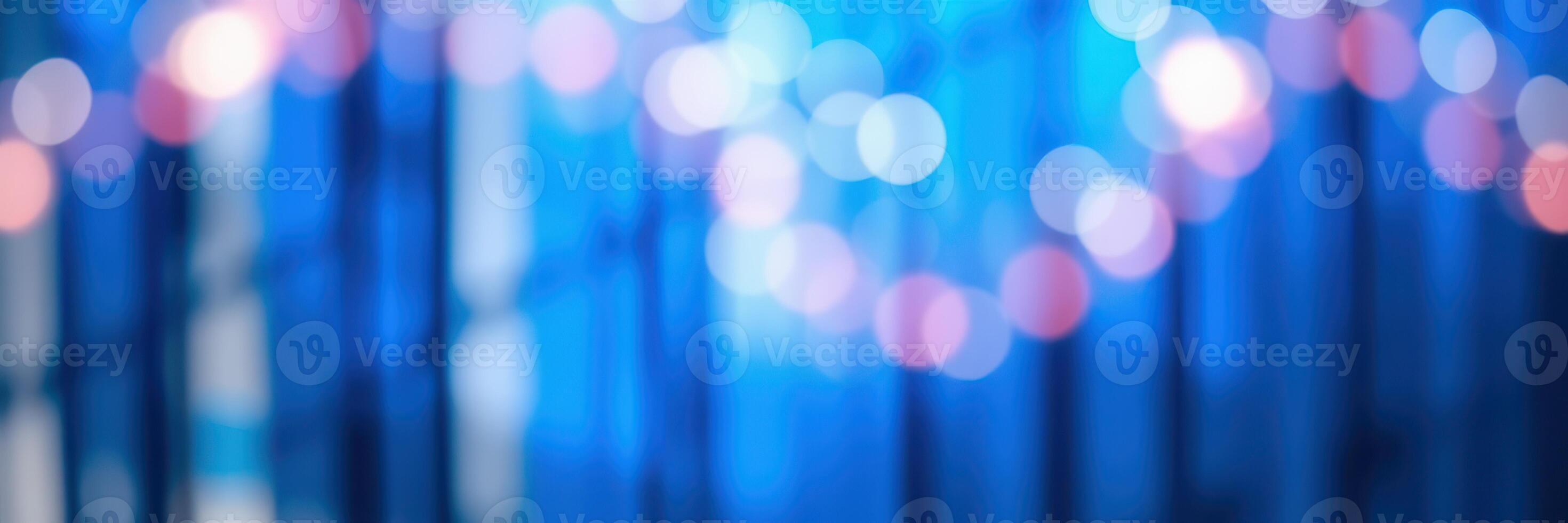 Colorful bokeh lights create a vibrant atmosphere in a festive evening setting photo