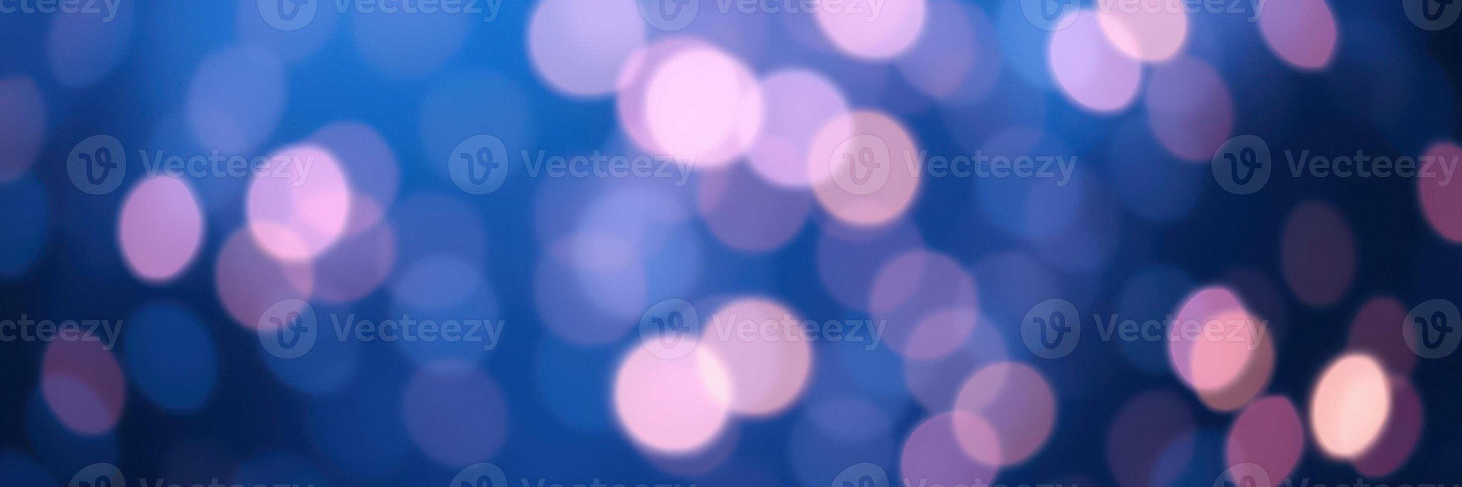 Soft bokeh lights create a dreamy atmosphere in a nighttime setting with colorful hues and sparkling effects photo