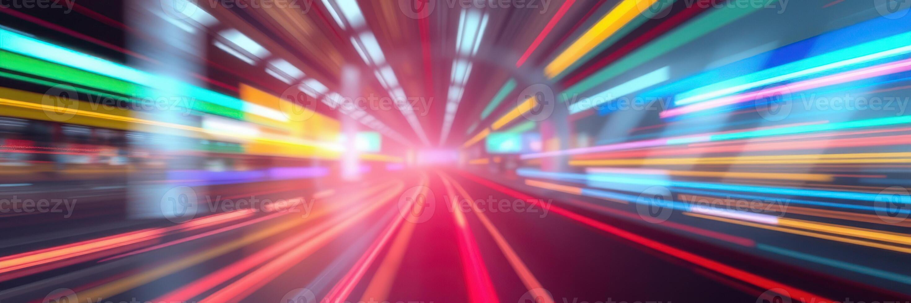 Vibrant light trails create dynamic motion in a blurred urban tunnel during nighttime photo