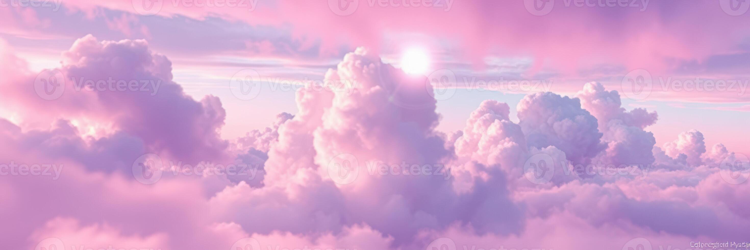 Sunset casts soft pink hues across fluffy clouds in a serene evening sky above the horizon photo