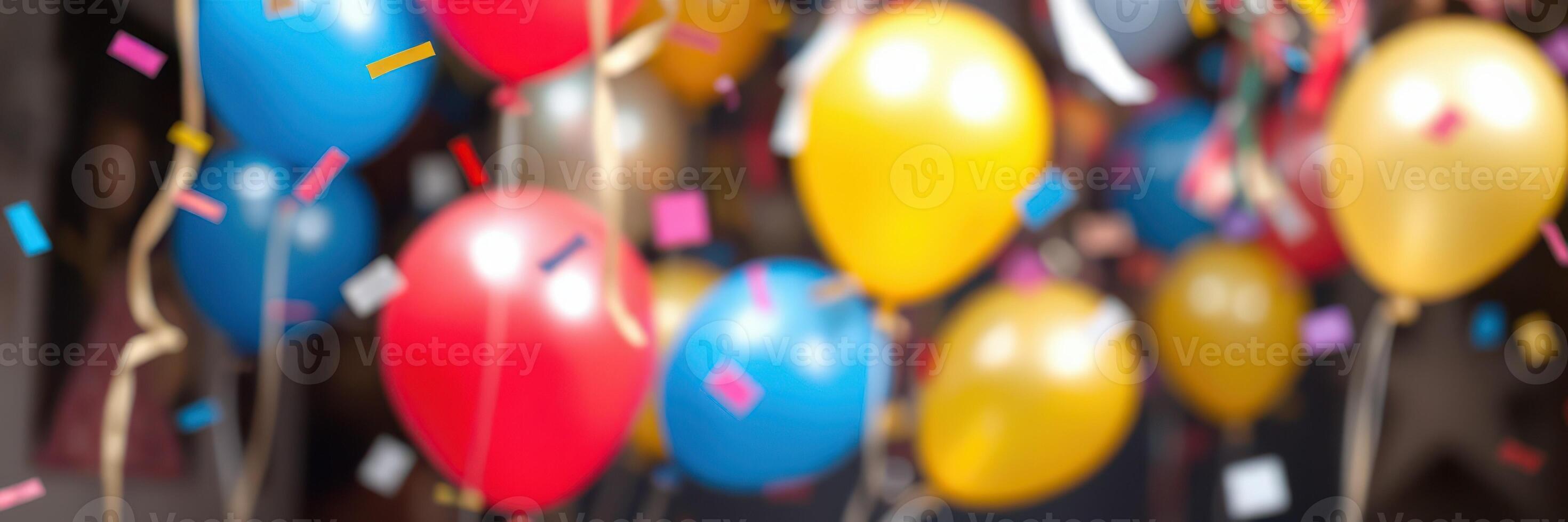 Colorful balloons and confetti create a festive atmosphere at a celebration event photo