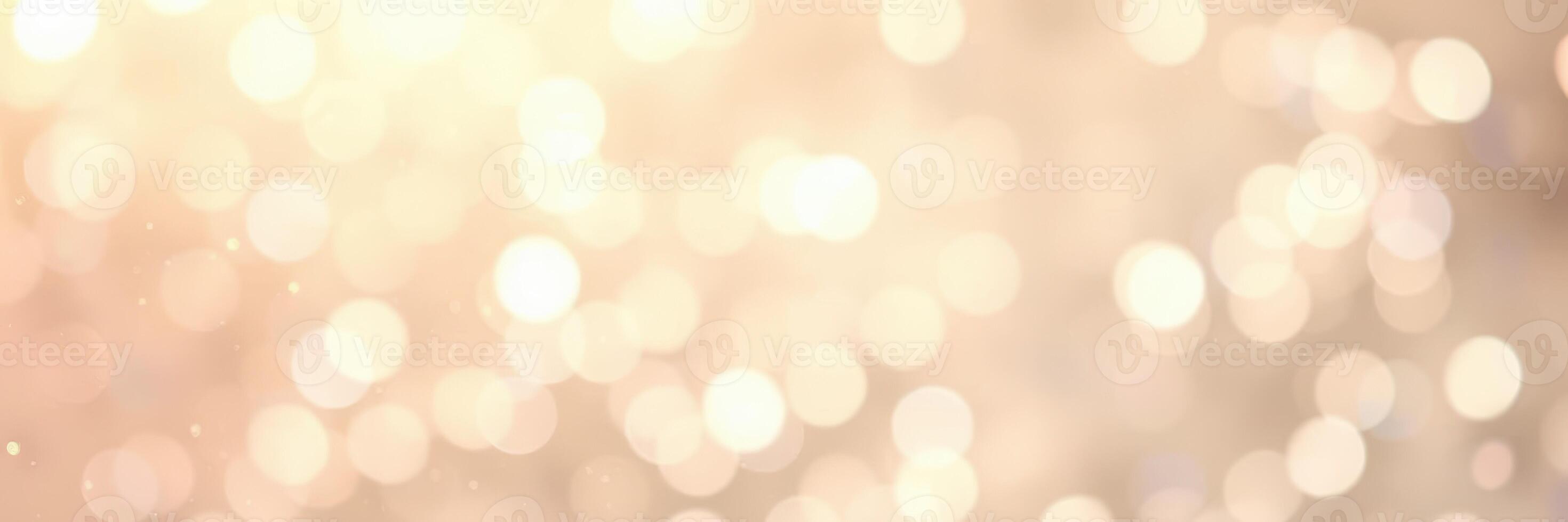 Shimmering golden bokeh effect creating an enchanting atmosphere at a festive gathering during evening hours photo