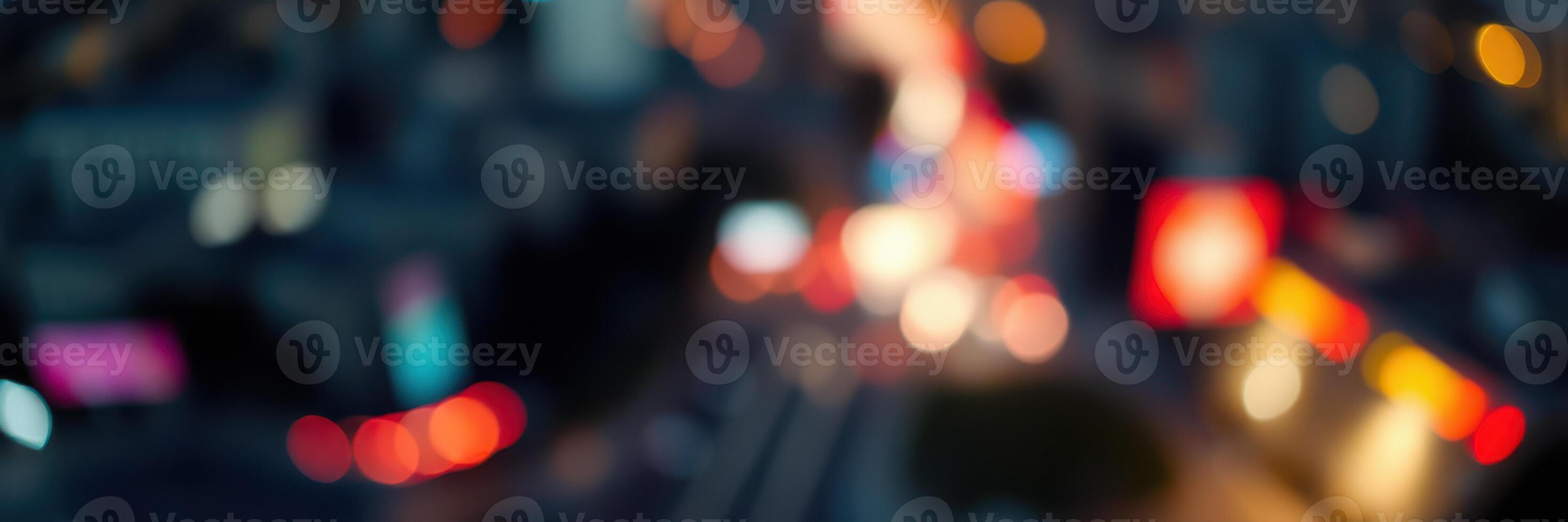 City lights create a vibrant atmosphere during nighttime in a bustling urban area photo