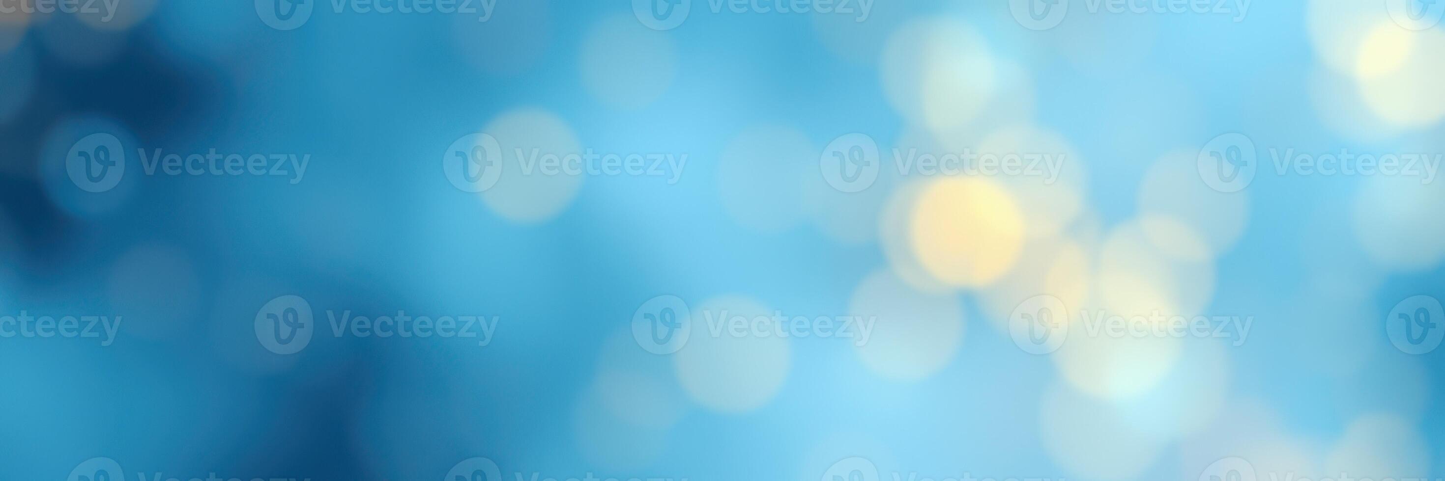 Beautiful blue bokeh pattern created by soft lights and reflections in an artistic display photo