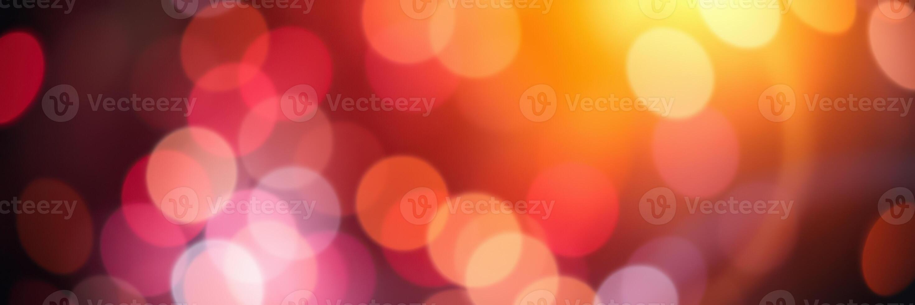 Vibrant abstract background created by colorful bokeh lights illuminating the atmosphere during a festive evening celebration photo