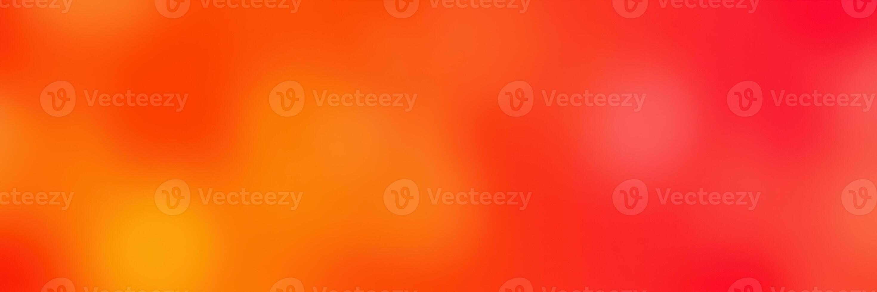 Bright abstract color background with vibrant shades of red, orange, and yellow blending seamlessly photo