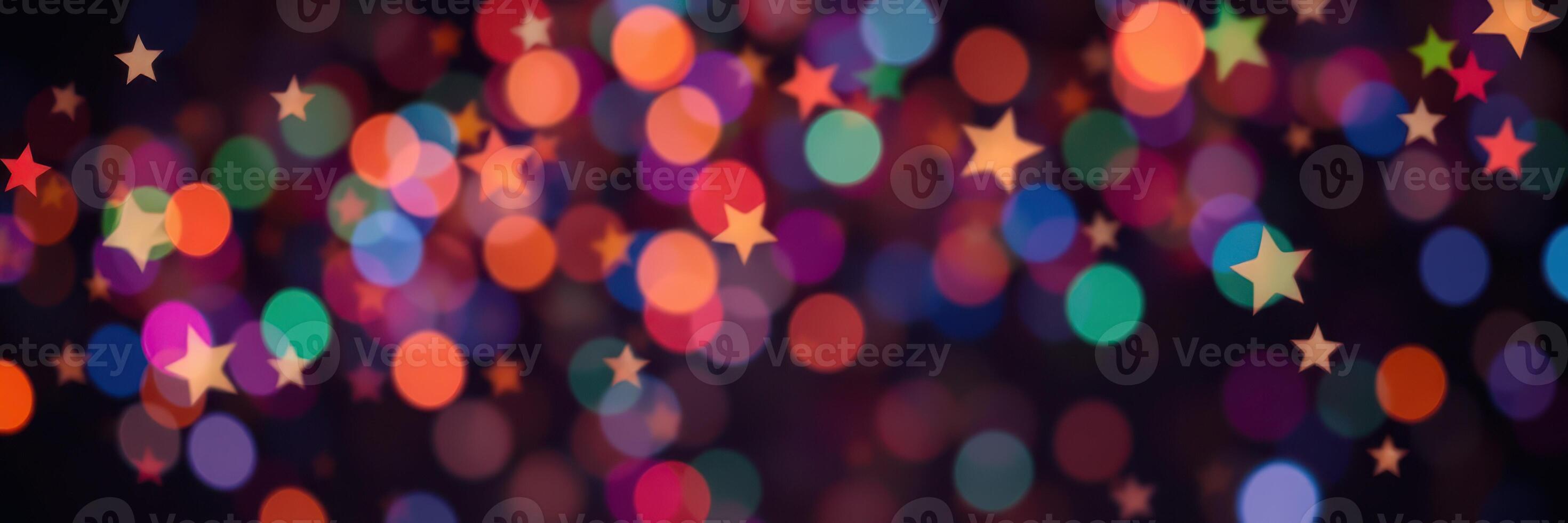 Colorful bokeh lights with star shapes create a festive atmosphere during a celebratory event at night photo