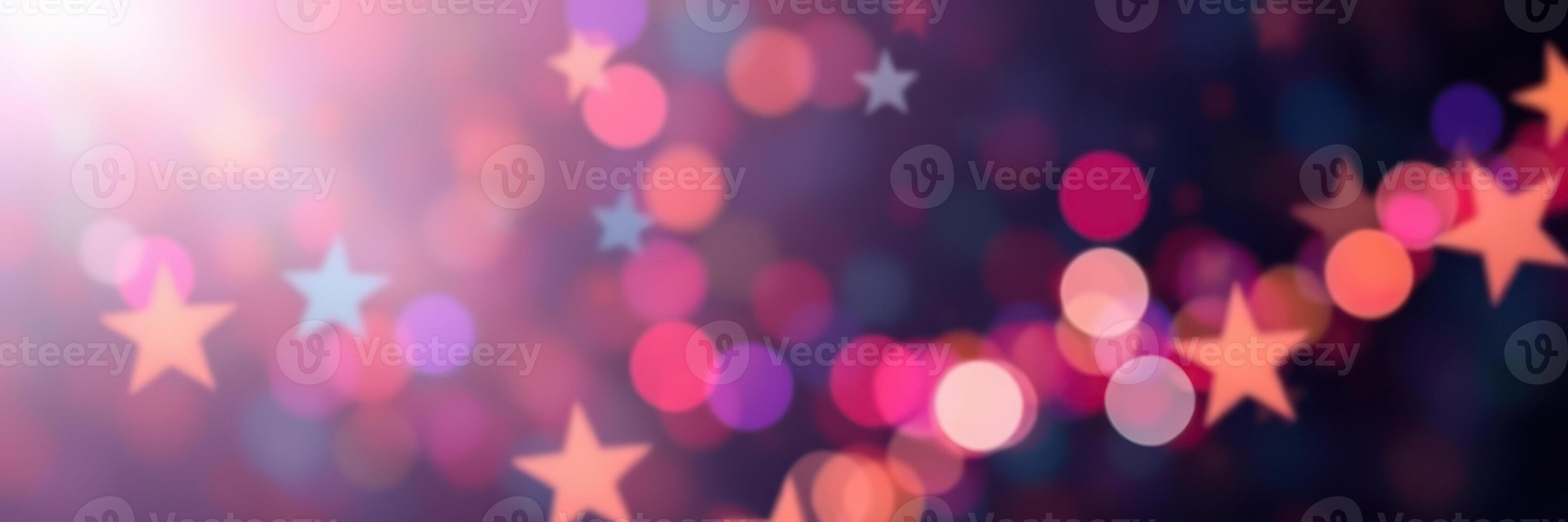 Colorful bokeh lights create a dreamy atmosphere with star shapes in a festive celebration setting photo