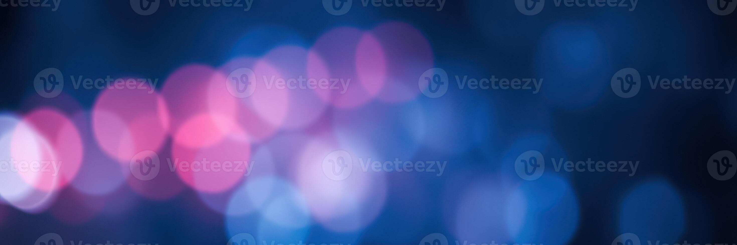 Vibrant bokeh lights create a mesmerizing colorful atmosphere at a night event in the city photo