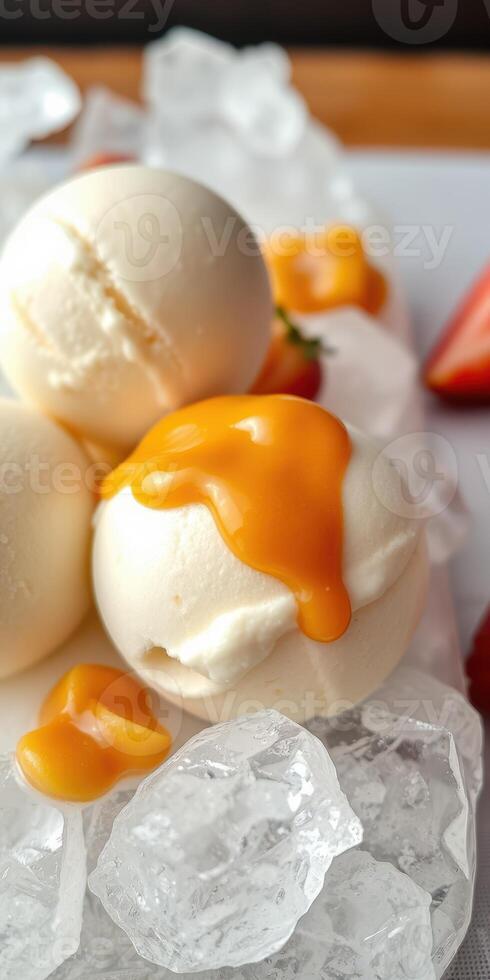 Creamy ice cream scoops topped with vibrant mango sauce and fresh strawberries on ice photo