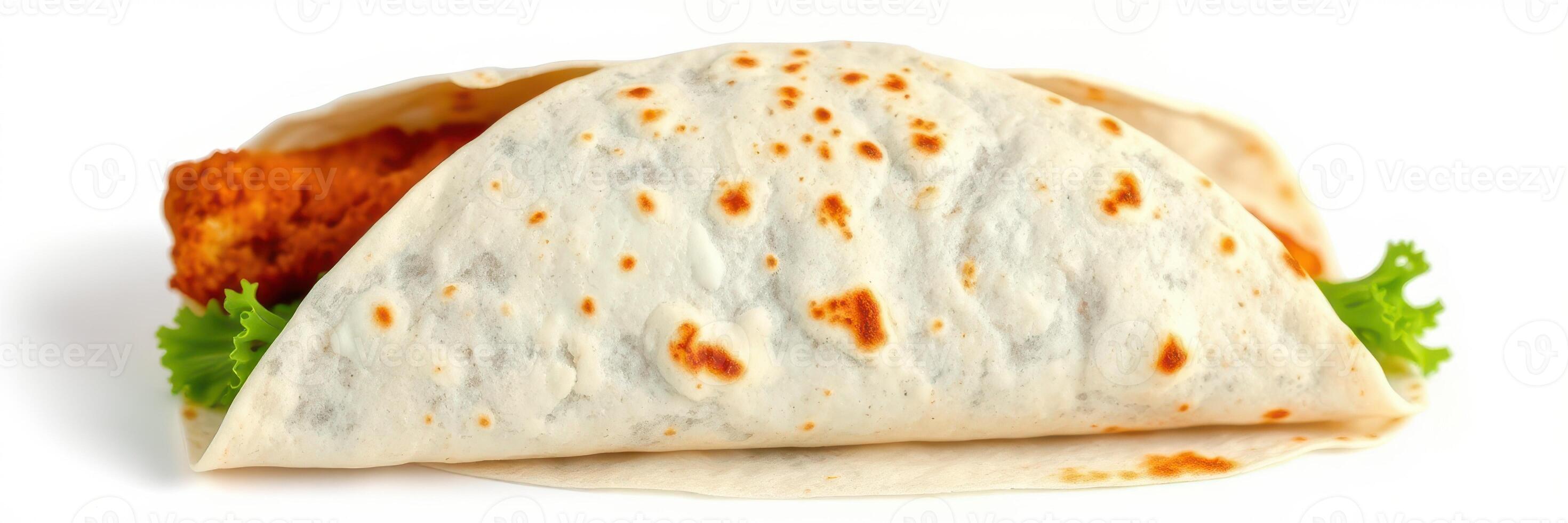 Tasty chicken wrap filled with fresh lettuce on a plain tortilla served as a quick meal option photo