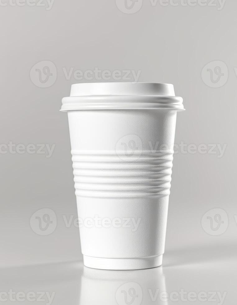 White disposable cup displayed on a light background with simple and modern design for beverages and drinks photo