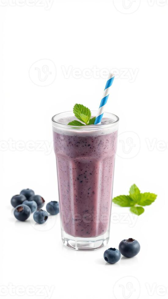 Refreshing berry smoothie served in a tall glass with mint leaves against a plain background photo