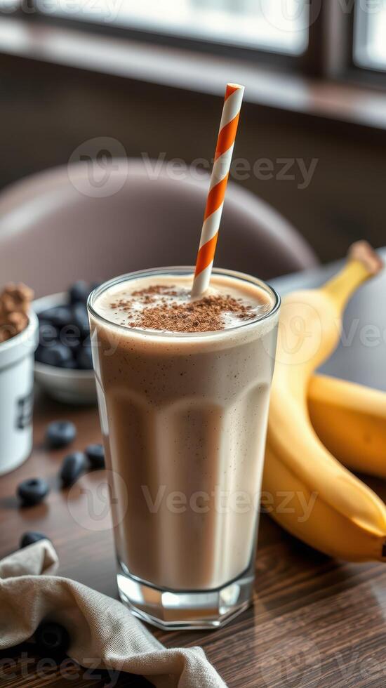 refrescante plátano zalamero servido con un decorativo Paja en un acogedor café ajuste foto