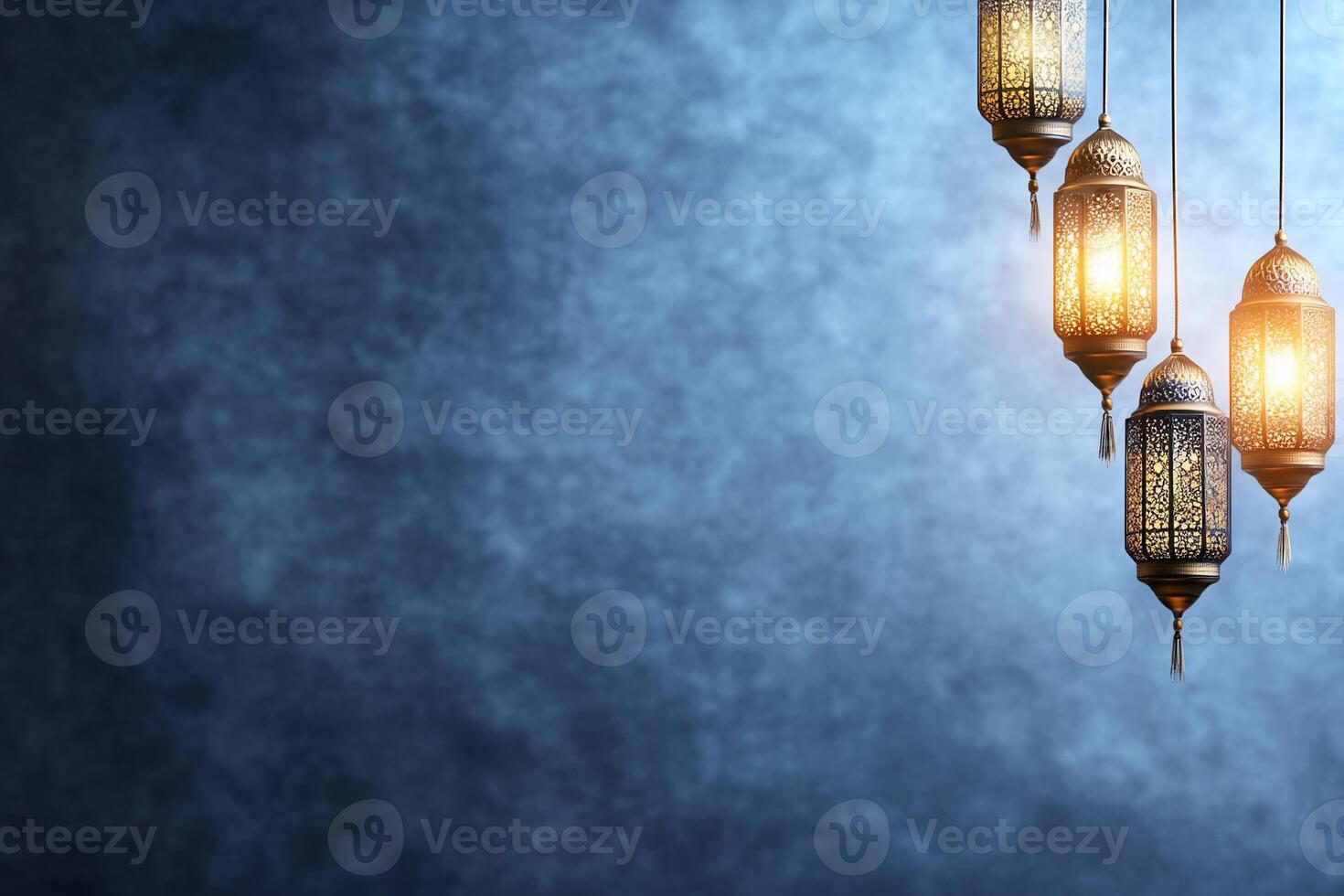 Three lamps hanging from a string on a blue background photo