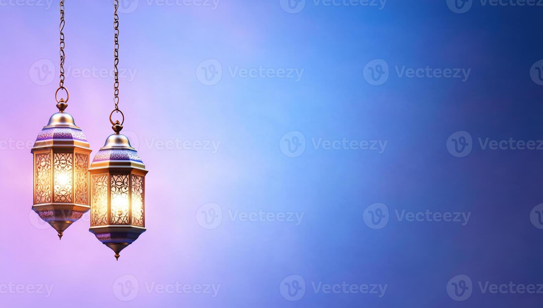 Two lamps hanging from chains on a blue background photo