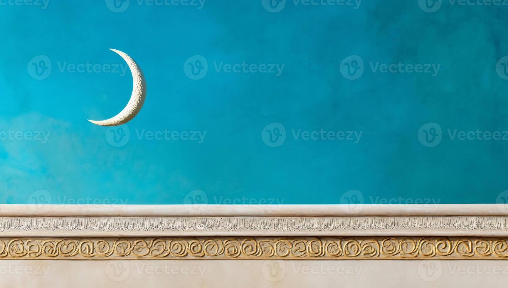 A crescent moon on a wall in front of a blue wall photo