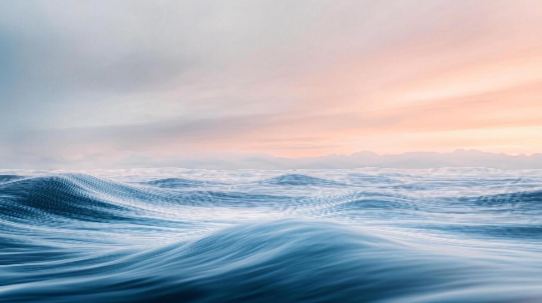 Calm ocean with a pink and orange sky in the background. The water is still and the sky is a beautiful mix of colors photo