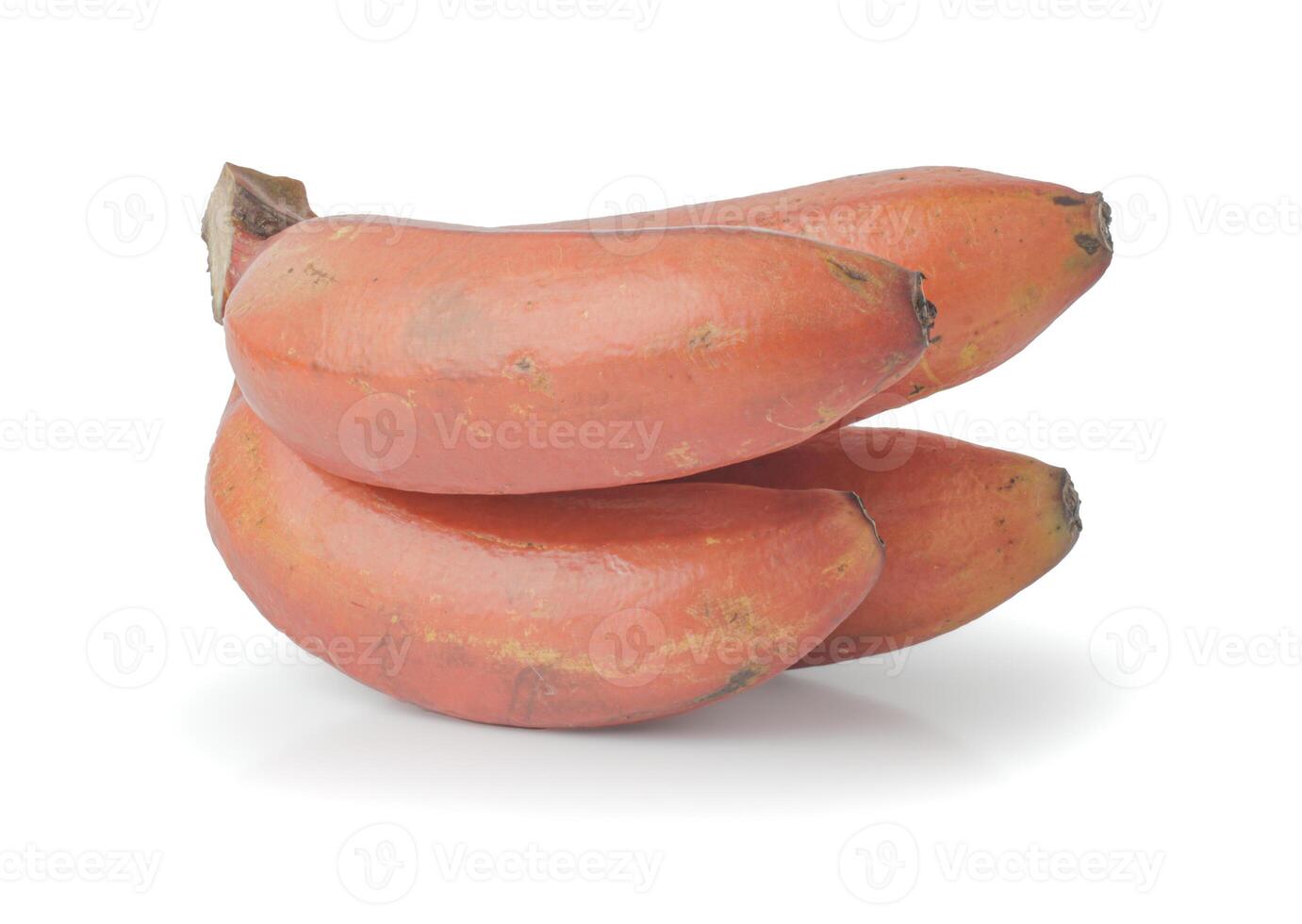 red bananas on a white background. The bananas are arranged in a cluster and are a bright red color. The bananas are ripe and ready to eat. photo