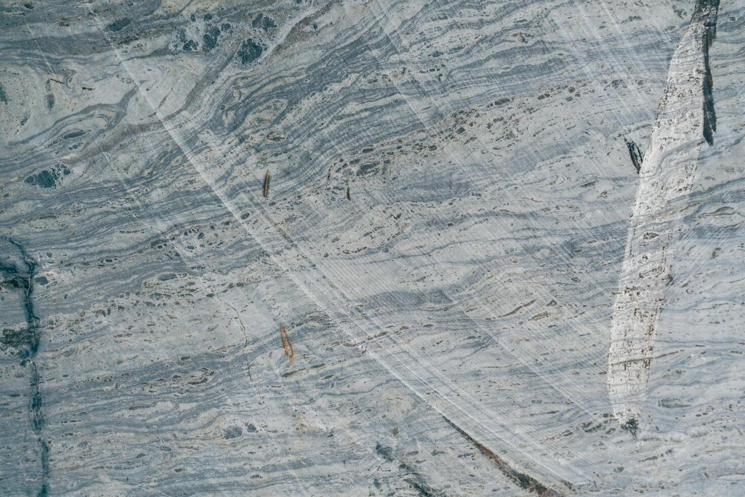 Background texture of a gray natural stone wall photo
