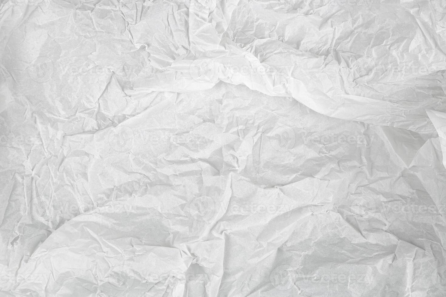 Crumpled white paper texture, abstract background. photo