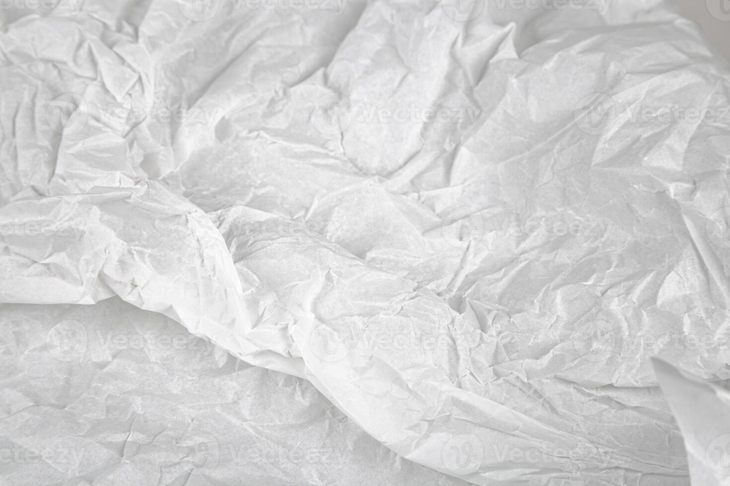 Crumpled white paper texture, abstract background. photo